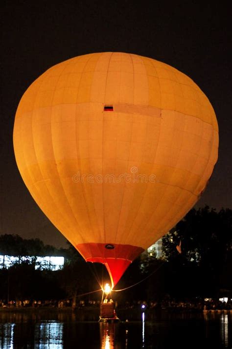 Hot Air Baloon Starting To Fly In The Evening Sky Editorial Image