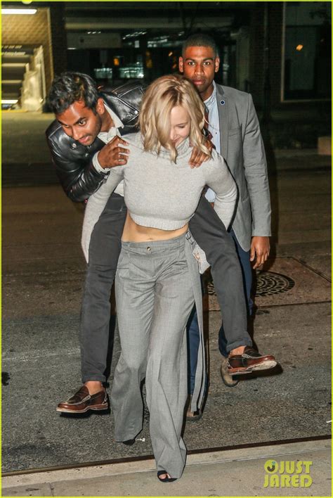 Jennifer Lawrence Gives Aziz Ansari A Piggyback Ride