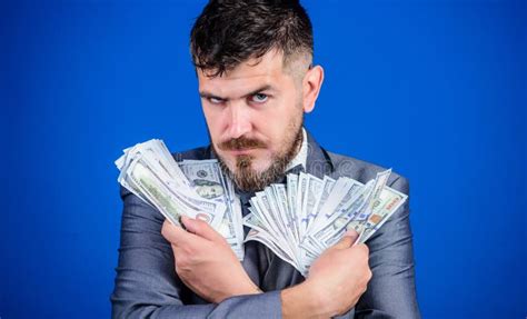 503 Man Holding Bundle American Currency Stock Photos Free And Royalty