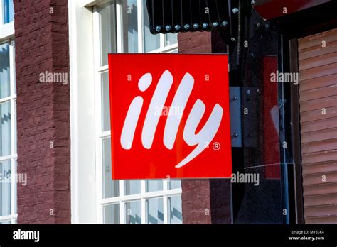 Illy Logo Sign On The Wall Illy Is Italian Coffee Roasting Company