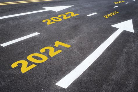 Road To Future Number 2021 To 2024 On Asphalt Road With Arrow Stock