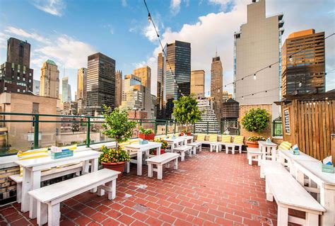 Several stories up to the. The 6 Best Rooftop Bars Midtown East New York City Has To ...