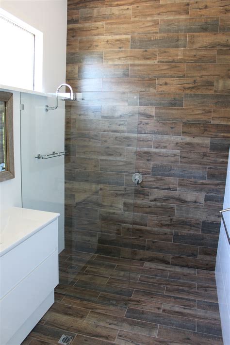 Light wood accents this room with warmth and added interest (roohome.com). Wood Look Tiles - Wood Bathroom - Wood Feature Wall ...