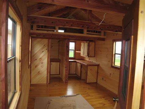 Countryside barns can finish out a shed just like a house, so it's super safe! Cabin, Amish and Tiny living on Pinterest