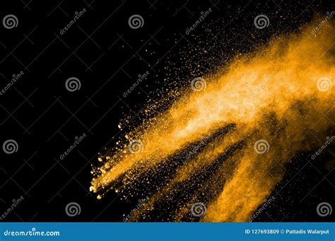 Deep Yellow Dust Particle Splattered On Black Background Royalty Free