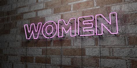 Women Glowing Neon Sign On Stonework Wall 3d Rendered Royalty Free