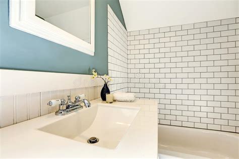But are they any good? Aqua Bathroom With White Tile Wall Trim. Stock Photo ...
