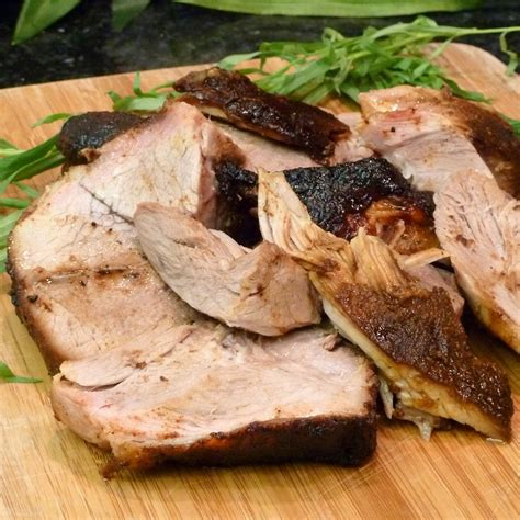 To make this roast pork shoulder recipe, you peel back the skin and make incisions in the meat, which allows the garlicky marinade to seep in. A Recipe for Pork Shoulder Roast in Dry Spice Rub