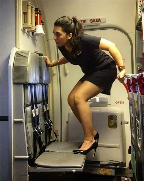 Extraordinary Scene As A Stewardess Prepares To Leap Onto The Back Of A
