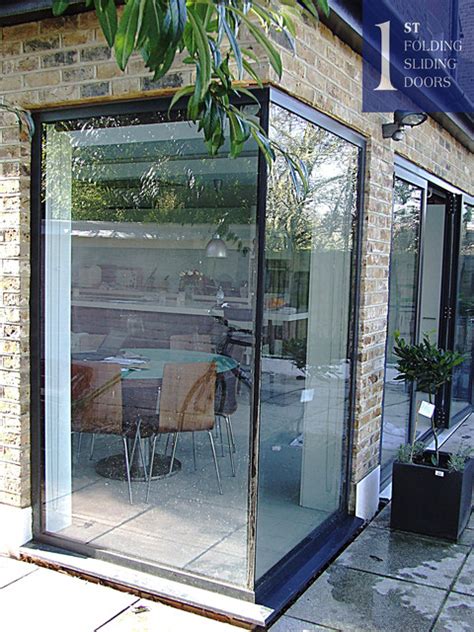 Frameless Glass Window Seats And Vertical Frameless Glass Window Modern Exterior London