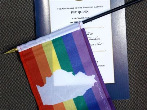 illinois governor signs same sex marriage into law