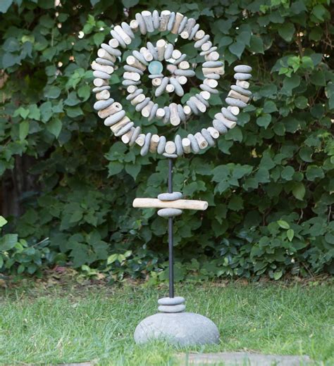 Stone Spiral Garden Sculpture With Glass Sphere Vivaterra Sculpture
