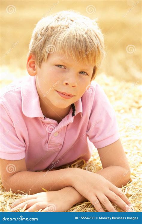 Portrait Of Boy Laying In Summer Harvested Field Stock Image Image Of