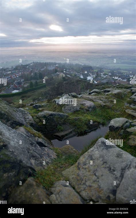 A View Of A Sunset Over The Cheshire Landscape From The Top Of Mow Cop