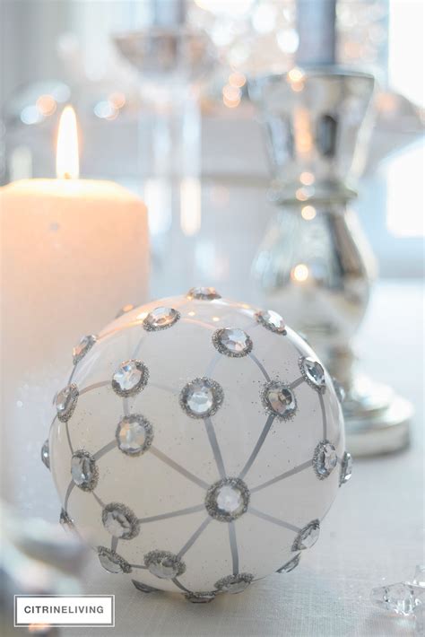 Contains a 3 inch loop for easy hanging. A WINTER WHITE AND SILVER HOLIDAY TABLESCAPE