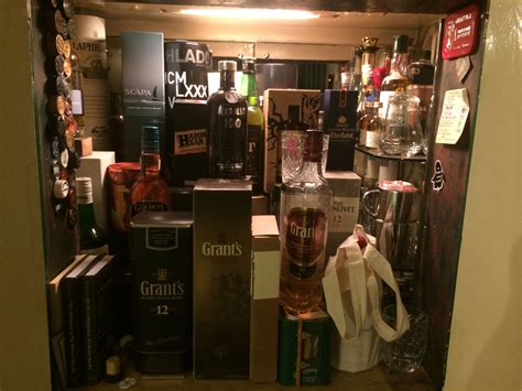 This bar cabinet with wine storage holds up to 18 bottles of wine. 5 steps to starting your whisky cabinet by Greg Dillon of ...