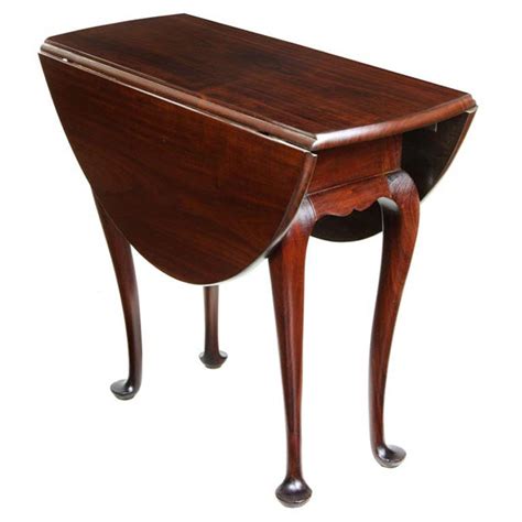 They come in all sorts of designs from a polished rustic number resembling frontier rude benches to sleek english classic tea tables. Queen Anne Style Diminutive Mahogany Drop-Leaf Table For ...