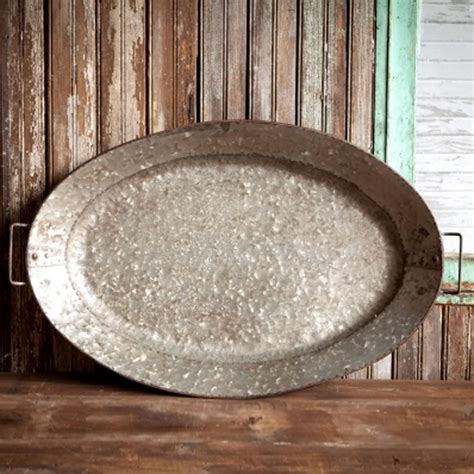 Our home decor will add function and flair to your nothing pulls a room together like garnet hill rugs and unique home decor. Park Hill Large Oval Tinwork Platter - FH2019