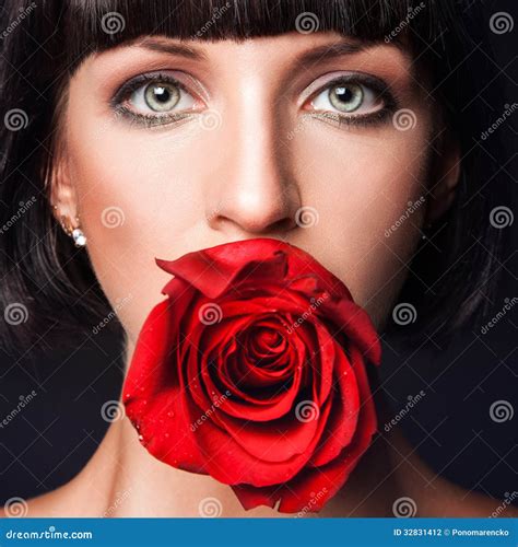 Portrait Of Pretty Woman With Red Rose In Mouth Stock Photo Image