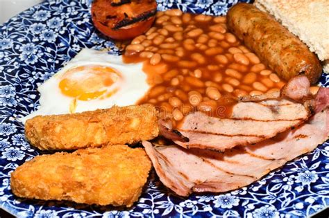 Full English Breakfast With Bacon Sausage Fried Egg Stock Photo