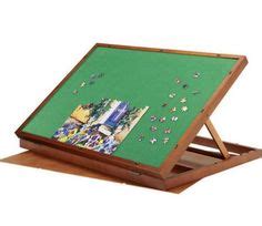 Our table design eliminates the frustration of lost pieces and clutter. Build your own jigsaw puzzle tray using this free plan ...