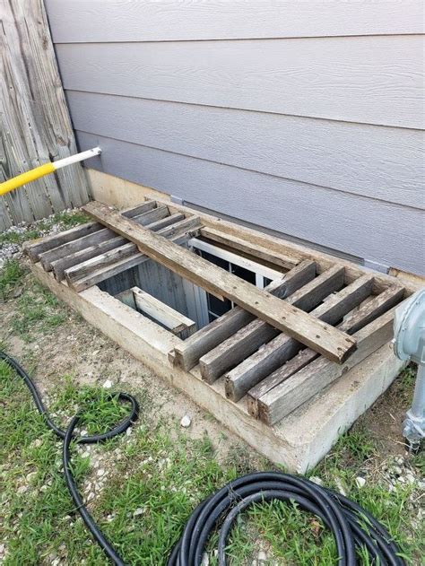 Sloped for rain, ice, and snow run off. Easy ways to make basement window well covers that aren't ...