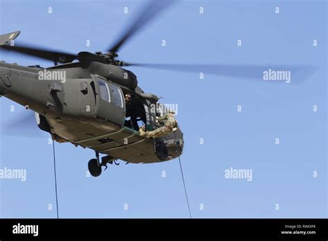 Soldiers Rappel From A Uh 60 Black Hawk Helicopter At Fort Bliss Texas