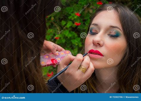 Professional Make Up Artist Doing Glamour Model Makeup At Work Stock