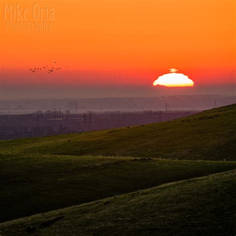 Top O The Mornin A Refracted Sun Breaks Through Atmosphe Flickr