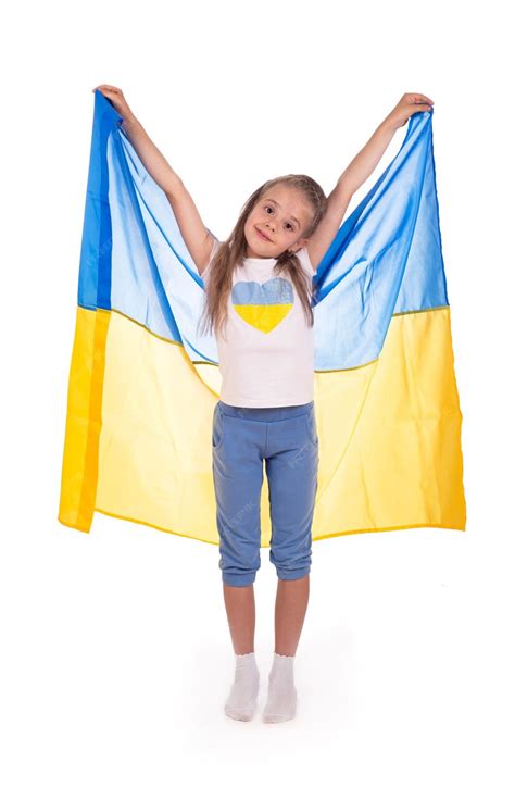 Premium Photo Happy Young White Girl Holding Ukraine Flag Isolated On A White Background