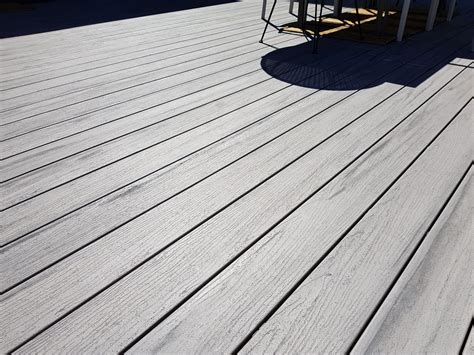 It is a more modern use of decking, moving away from the traditional wood colours such as the. Silver Gum; #ModWood #WideDecking #Apartment | Timber deck ...