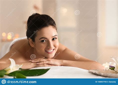 Young Woman Relaxing On Massage Table At Spa Salon Stock Image Image Of Adult Relaxation