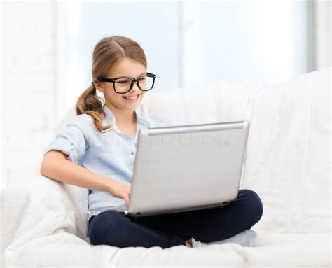 Smiling Girl In Specs With Laptop Computer At Home Stock Image Image