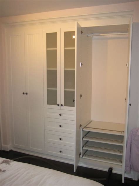 Ikea hack wall unit coffee and pine, ikea besta tv wall unit assembled & wall mounted ikea. Image by debbie main on Tall Cabinets | Bedroom wall ...