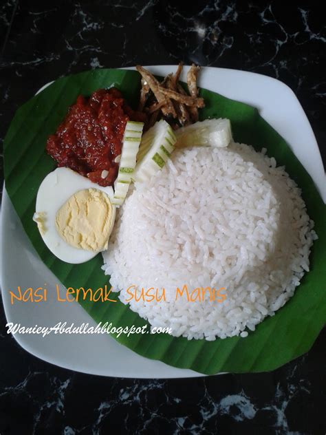 Nasi lemak is malaysia's staple food. ..Di lesung pecah..: Nasi Lemak Susu Manis