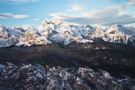 Beautiful Alpine Chain Of Snowy Mountains Of Julian Alps In Sunset Blue