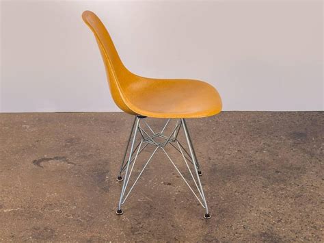 Museum quality 1985 eames herman miller ec175 upholstered fiberglass shell chair. Ochre Eames Shell Chair on Nickel Eiffel Base at 1stdibs