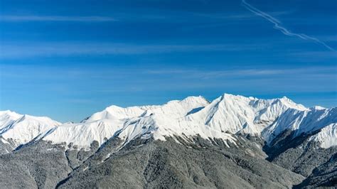 Premium Photo Awesome View Of The Caucasus Mountains Covered By Snow