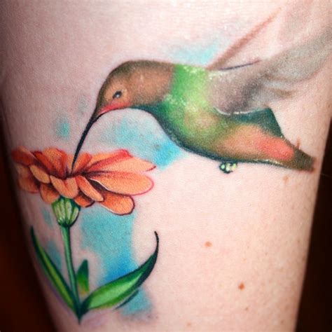 A hummingbird tattoo below is shown on the middle finger of the hand, the tattoo is very small, but the connotation of the pattern is the unusual thinking, love for all creative and interesting. Tattoo Lovely Jasmine Flower In Orange With A Humming bird ...