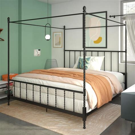 This elegant bed boasts an arched cast iron headboard complemented by the dipped line of the footboard. DHP Anika Metal Canopy Bed, King Size Frame, Black ...