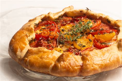 Tomato Galette With Honeyed Goat Cheese Caramelized Shallots And Fresh