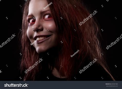 Close Up Portrait Of Evil Girl Possessed By A Demon Stock Photo