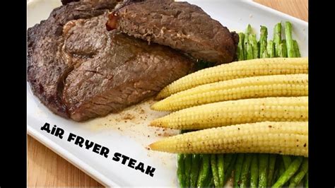 Air fryer steak is seasoned with salt and pepper, then cooked in an air fryer until it's tender and juicy, and ready in only 15 minutes! Air Fryer Steak with Asparagus and Corn - YouTube
