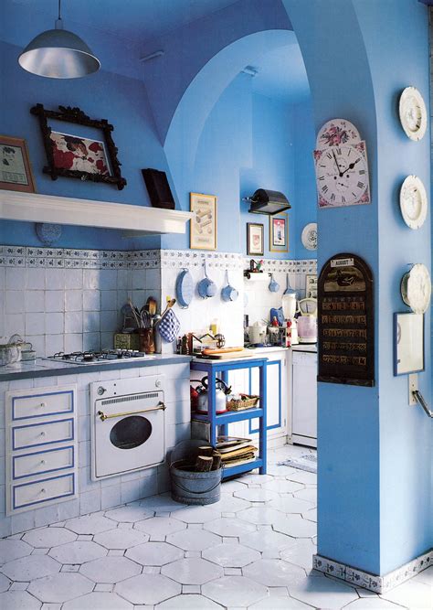Base a kitchen or living room around blue and white plates and then hang your inspiration pieces on the wall. Rustic style French Country kitchen with light and airy ...