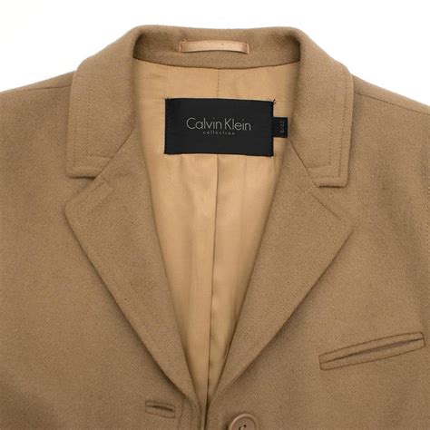 Erbjudandet gäller så länge lagret räcker. Calvin Klein Collection Camel Wool and Cashmere Blend Coat ...