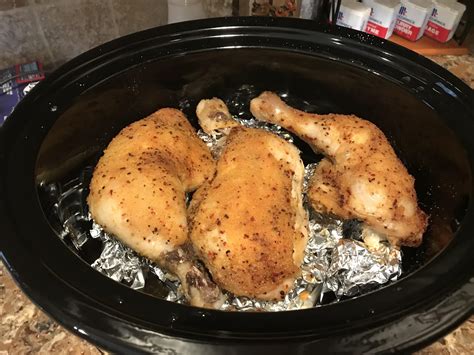 Chicken Quarters Placed On Top Of Balled Up Tin Foil It Keeps The