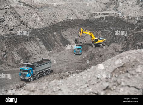 Large Quarry Dump Truck Loading The Rock In Dumper Loading Coal Into