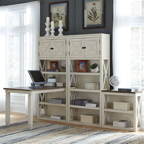 The designers who created these beautiful masterpieces, had to make sure the books would have room to fit, sturdy enough to withstand weight/ware, and last but not least be visually attractive. Bolanburg Desk W/ Large Bookcase Signature Design ...