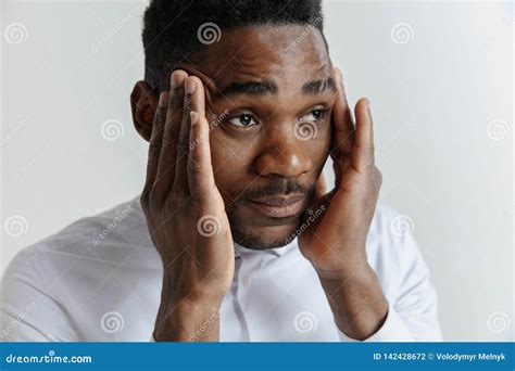Stressed Young African American Man Having Terrible Strong Headache