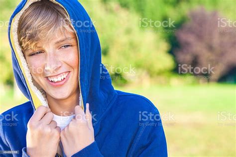 Happy Boy Male Child Teenager Laughing Wearing Hoody Stock Photo